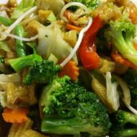 Chicken With Mixed Vegetables · Chicken breast sautéed with garlic, baby corn, broccoli, cabbage, carrots, onion and bell pe...