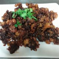 Crazy Beef · Spicy. Battered and fried beef sautéed with fresh garlic, chili, sweet chili paste; topped w...