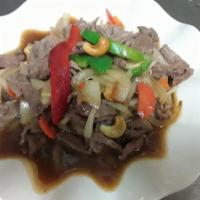 Cashew Beef · Beef sautéed with onion, green onions, bell pepper and cashew nuts.