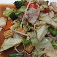 Pork With Mixed Vegetables · Pork sautéed with garlic, baby corn, broccoli, cabbage, carrots, onion and bell pepper.