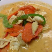 Panang Curry · Spicy. Choices of chicken beef or pork simmered in thick red curry paste, coconut milk, bell...
