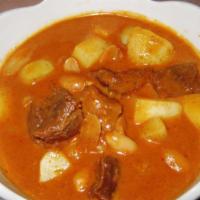 Peanut Beef Curry · Chunks of tendered beef simmered in special curry paste with peanut, coconut milk and potato...