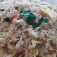 House Fried Rice · Pan stir fried rice with choices of chicken, beef or pork with egg, onion, carrots, and toma...
