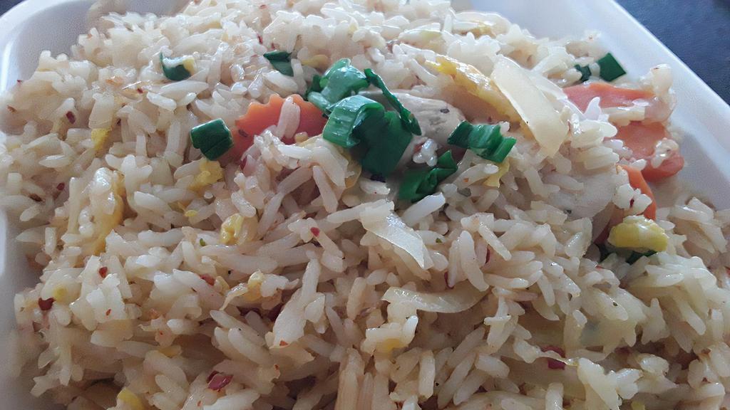 House Fried Rice · Pan stir fried rice with choices of chicken, beef or pork with egg, onion, carrots, and tomatoes with house's own special sauce.