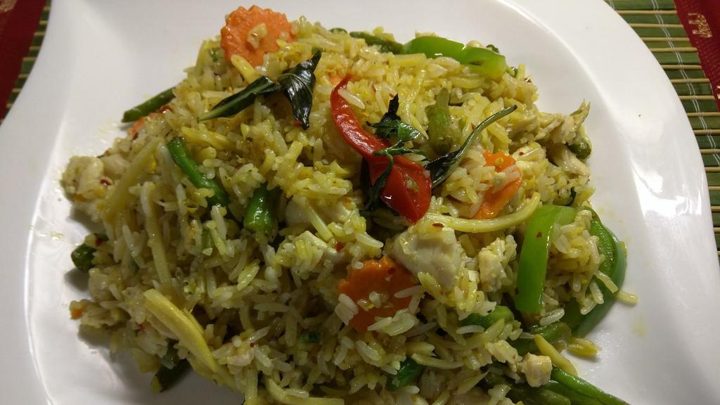 Spicy Fried Rice · Spicy. Sautéed chicken, beef or pork with garlic, chili bamboo shoots, bell pepper and Thai basil.