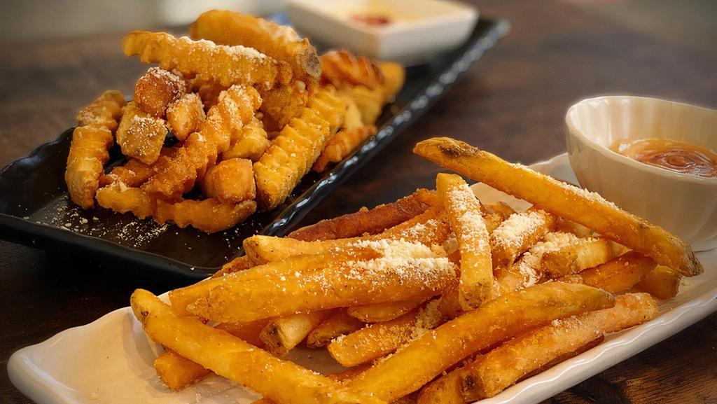 Cajun Fries · French Fries in a different light seasoned with cajun powder & spice delight.