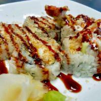 Crunch Roll · Inside: Crabmeat, Avocado, Shrimp Tempura 
Out: Tempura Flake