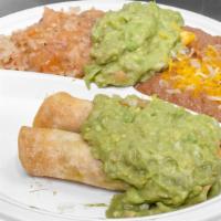 #7 -2 Taquitos · (beef or chicken) with guacamole