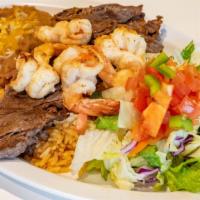 Carne Asada Con Camarones Plate · Grilled flap meat served with grilled shrimp. Served with rice, beans, salad, and tortillas.