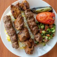 Beef Soltani · A & H Shawarma favorite: Served with pita bread, basmati rice, grilled tomato, jalapeño and ...