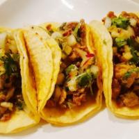 Street Tacos (3) · Choice of meat (asada beef or chicken or pork carnitas or pork al pastor) with onions, cilan...