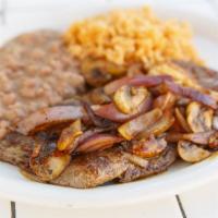 Carne Asada · Top sirloin Angus choice with mushrooms and grilled onions, rice, beans, guacamole. Choice o...