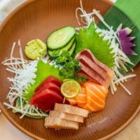 Sashimi Set · Tuna, salmon, yellowtail, albacore, chopped wasabi, and orange lime ponzu sauce, 2 sides.