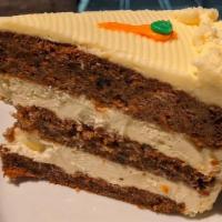Carrot Cake · 3-Layer sliced cake with cream cheese frosting.