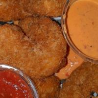 Remoulade · **Pictured with our Fried Shrimp. A creamy, orange sauce that is slightly sweet + slightly O...