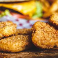 Kids Chicken Nuggets · Five tenders, juicy, all white meat chicken nuggets. Served with fries and small soda.