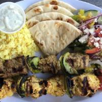 Grilled Souvlaki Combo · Skewers of marinated beef, lamb, chicken, or shrimp (2).