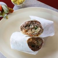 Carne Asada Burrito · includes carne asada, beans, rice, onions & cilantro, salsa