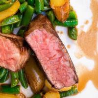 New York Steak  · Black Angus, roasted fingerling potatoes, carrots, brussel sprouts, chimichurri