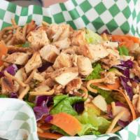 Chinese Chicken Salad · Crispy romaine lettuce, grilled skinless chicken breast, red cabbage, grated carrots, edamam...