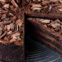 Chocolate Fudge Cake · Alternating layers of rich fudgy cake and smooth chocolate butter cream, covered with chocol...