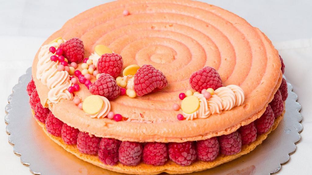 Rose Lychees Raspberry Macaron Cake · Love macarons? Why not celebrate with a giant one. Two rose macaron filled with rose lychees ganache and fresh raspberries!