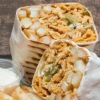 The Planet Chicken Shawarma Wrap · French fries, cucumber pickle, and garlic sauce served in saji bread served with side order ...