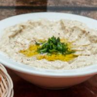 Baba Ghanoush (Moutabal) With Pita Bread · Vegan. Made from freshly grilled Eggplant blended with tahini olive oil, lemon juice, and sa...