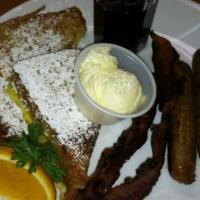 French Toast Sandwich · Served with three eggs and four bacon or sausage.