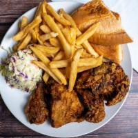 Fried Chicken · Half Chicken cut into Four Pieces, Fries, Cole Slaw and Bread