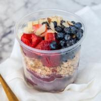 Acai Bowl · Organic acai sorbet, honey granola, bananas, strawberries, blueberries,  almond slices, coco...