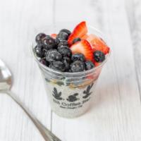 Chia Seeds Pudding · Vegan coconut chia pudding with blueberries and strawberries. Topped with Agave.