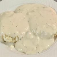 1/2 Biscuit & Gravy · 1 biscuit cut in half topped with sausage country gravy