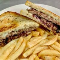 Patty Melt  · Hamburger patty on grilled rye bread, with melted swiss cheese and grilled onions.