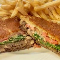 San Francisco Roast Beef Melt · Cooked in house roast beef on sourdough dipped in parmesan cheese spread with our 1000 Islan...
