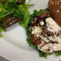 Greek Burger · 1\4 lb beef patty on a wheat bun, with tzatziki sauce, lettuce, tomato, smothered onions, cu...