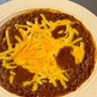 Bowl Of Chili · Homemade Chili topped with red onion &  Cheese.