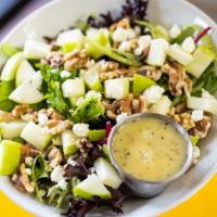 Apple Goat Cheese Salad · Mixed Greens, diced Apples, Toasted Walnuts, Goat Cheese, Poppyseed Vinaigrette
