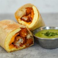Bacon, Egg And Cheddar Burrito · 3 fresh cracked cage-free scrambled eggs, melted Cheddar cheese, smokey bacon, hash browns w...