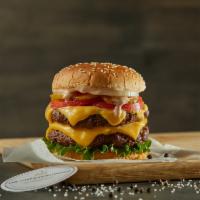 Double Cheeseburger · Cheddar double cheeseburger with lettuce, tomatoes, onions, pickles, ketchup, and mustard