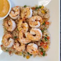 Shrimp Fried Rice · Served with egg, peas, carrots, and onions.