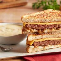 Patty Melt · Seasoned beef patty with melted Swiss and American cheese and sautéed onions on grilled rye ...