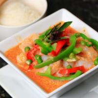 Panang Curry · Spicy. Panang curry paste, carrot, peas and bell peppers and bell pepper in coconut milk.