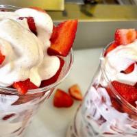 Strawberries And Cream · Fresh cut strawberries mixed with our special sweet cream, topped with whipped cream.