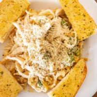 Chicken Alfredo · Fettuccine pasta with Alfredo sauce and topped with grilled chicken and shredded Parmesan.