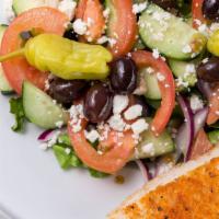 Greek Salad · Mixed greens, onions, tomato, cucumber, feta cheese, & olives served with balsamic vinaigret...