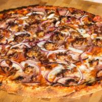 Meat Lovers · Sauce, cheese, pepperoni, ham, salami, bacon, onion, & sausage.