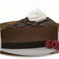 Belgian Chocolate Mousse Cake · A very Light & Creamy Chocolate Mousse sandwiched between a rich Belgian Chocolate Cake.