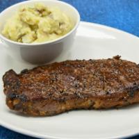 Certified Angus Beef New York Strip · Gluten-sensitive. 12 oz, served with choice of side.