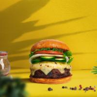 Vegan Jalapeno Burger · Seasoned plant-based patty topped with melted vegan cheese, jalapenos, lettuce, tomato, onio...